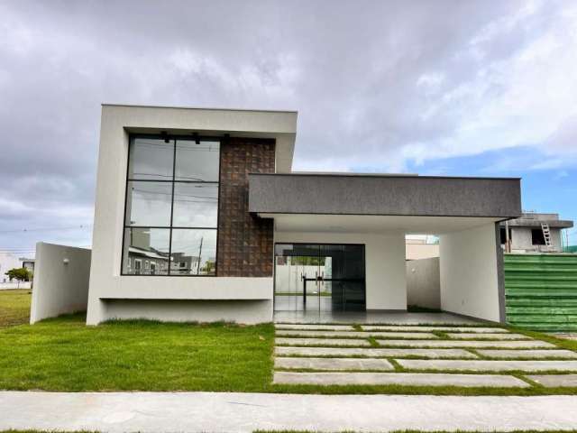 Casa com 3 dormitórios à venda, 129 m² por R$ 820.000,00 - Alphaville Camaçari - Camaçari/BA