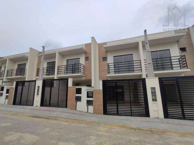 Sobrado com 3 dormitórios à venda, 100 m² por R$ 494.880 - Itacolomi - Balneário Piçarras/SC