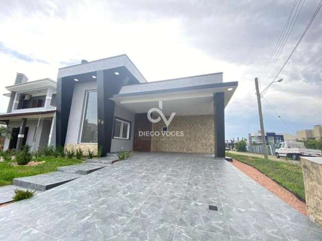 Casa em condomínio fechado com 3 quartos à venda no Cruzeiro do Sul, Tramandaí , 150 m2 por R$ 1.069.000