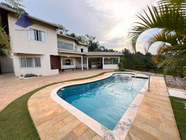 Casa em condomínio fechado com 3 dormitórios à venda, 264 m² por R$ 1.680.000