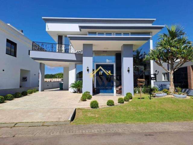 Casa com 4 dormitórios e 2 suítes à venda, por R$ 2.900.000 - Condomínio Marítimo - Tramandaí/RS