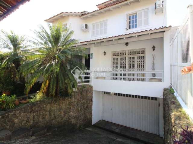 Casa em condomínio fechado com 3 quartos à venda na Rua Professora Thereza Noronha, 70, Espírito Santo, Porto Alegre, 383 m2 por R$ 860.000