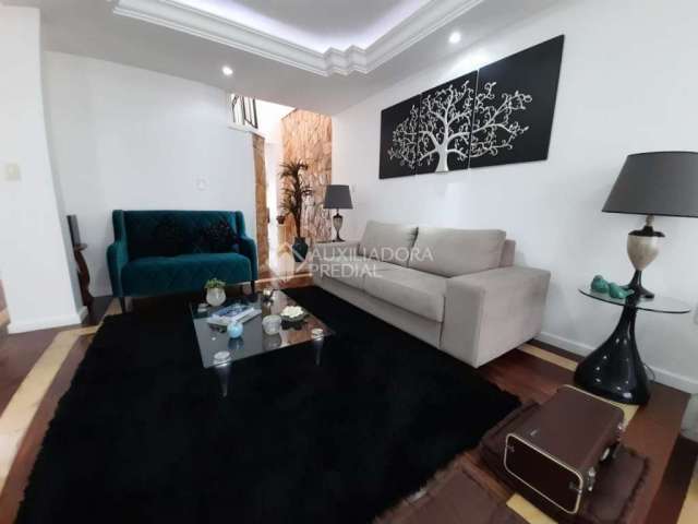 Casa com 4 quartos à venda na Rua Celso Martins da Silveira, 127, Carianos, Florianópolis, 241 m2 por R$ 1.500.000