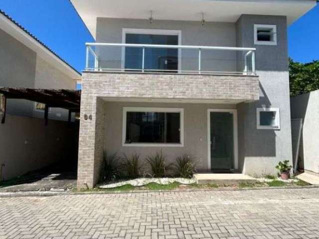 Casa com 3 dormitórios à venda, 105 m² por R$ 630.000,00 - Buraquinho - Lauro de Freitas/BA