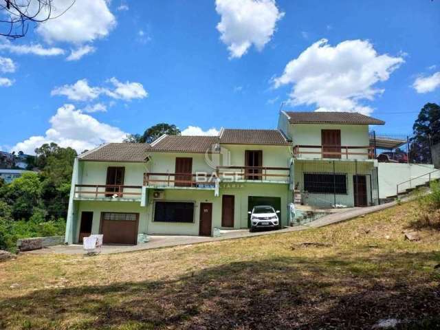 Casa com 2 quartos à venda na Avenida dos Girassóis, 540, Charqueadas, Caxias do Sul, 94 m2 por R$ 250.000