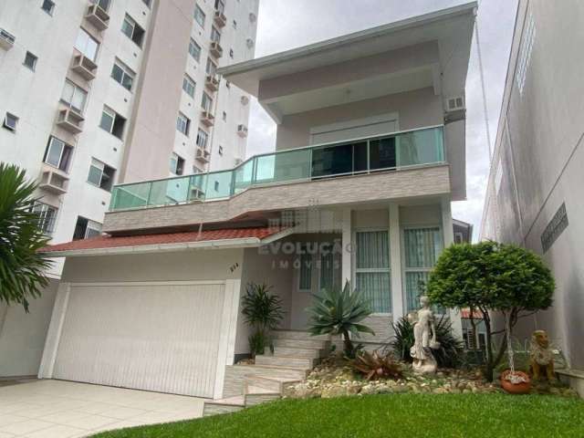 Casa com 3 dormitórios à venda, 330 m² por R$ 2.500.000,00 - Campinas - São José/SC