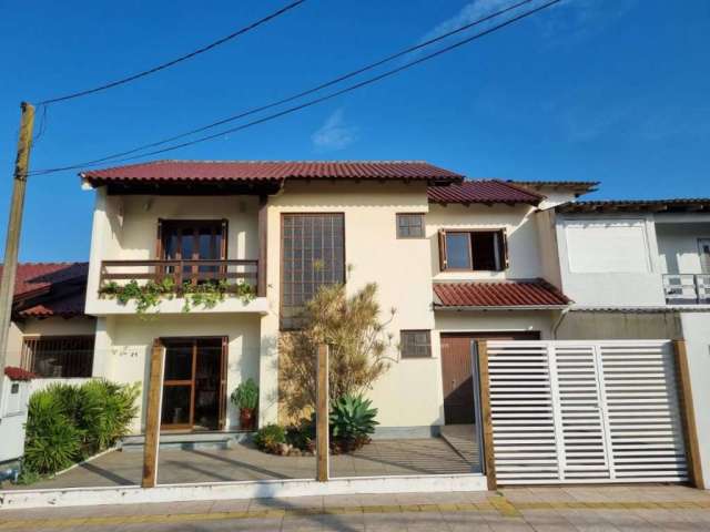 Casa com 3 dormitórios à venda, 160 m² por R$ 735.000,00 - Girassol - Gravataí/RS