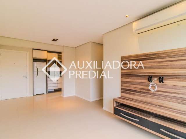 Apartamento com 2 quartos, 1 vaga de garagem, com 61 m² privativos no bairro Menino Deus em Porto