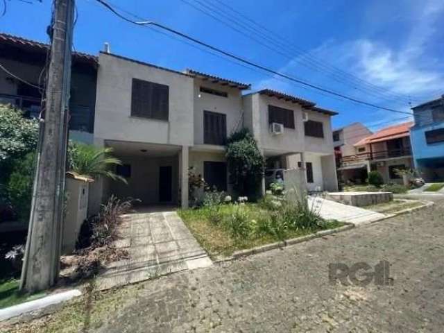 Casa em condomínio fechado com 3 quartos para alugar na Rua Ponciano Pacheco da Silveira, --, Guarujá, Porto Alegre, 167 m2 por R$ 1.900