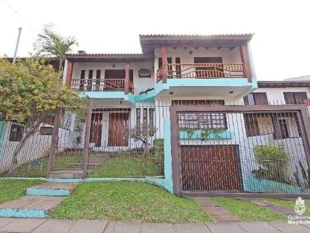 Casa com 4 quartos à venda na Rua Doutor João Palombini, --, Ipanema, Porto Alegre, 345 m2 por R$ 1.100.000