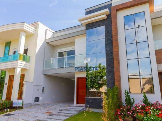 Casa com 3 dormitórios à venda, condomínio fechado, 194 m² por R$ 1.190.000 - Bairro Deltaville - Biguaçu/SC