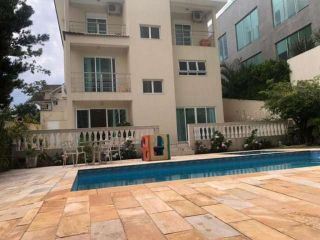 Casa em condomínio fechado com 4 quartos para alugar na Rua Cerejeira, Tamboré, Santana de Parnaíba, 400 m2 por R$ 22.000