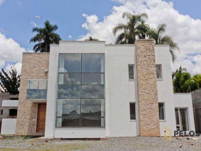 Sobrado em condomínio fechado, 3 suítes à venda, 345 m² por R$ 3.105.000 - Tremembé
