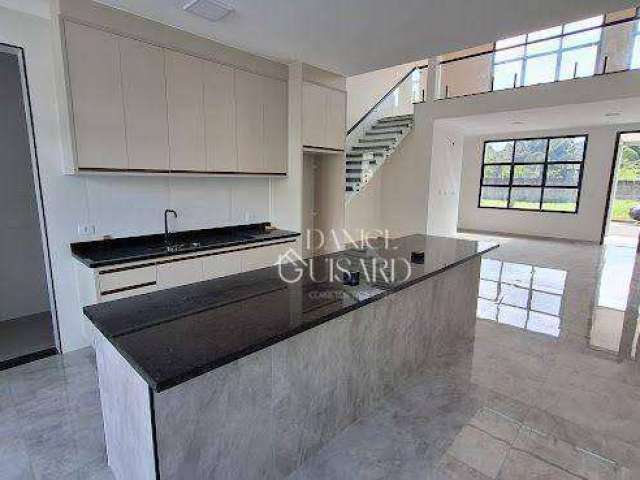Casa com 3 dormitórios à venda, 220 m² por R$ 1.270.000,00 - Condomínio Parque das Araucárias - Tremembé/SP