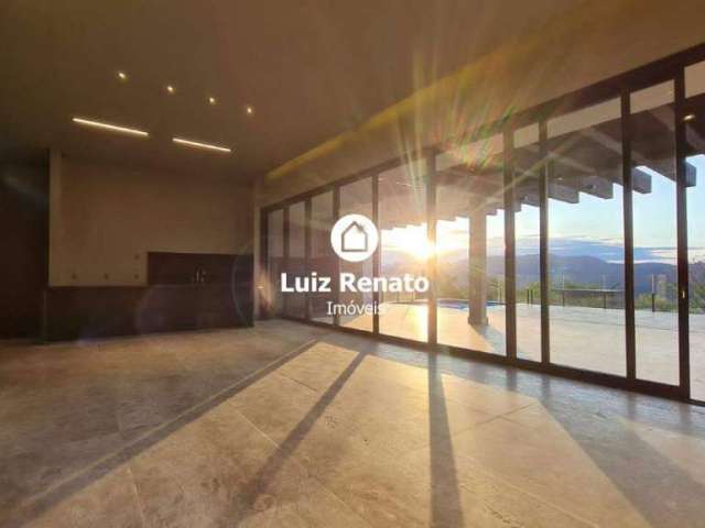 Linda casa linear nova, 520 m2, 4 suítes, vista maravilhosa, lazer completíssimo no condomínio Quintas do Sol, Nova Lima.