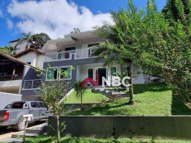 Casa com 4 dormitórios à venda, 298 m² por R$ 2.010.000,00 - Condomínio Country Club - Arujá/SP