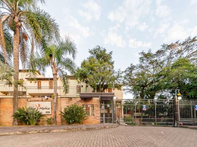 Casa em condomínio fechado com 3 quartos à venda na Rua Edgar Luiz Schneider, 550, Jardim Isabel, Porto Alegre por R$ 900.000