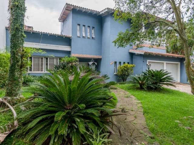 Casa com 4 quartos à venda na Conselheiro Xavier da Costa, 1830, Jardim Isabel, Porto Alegre por R$ 1.700.000