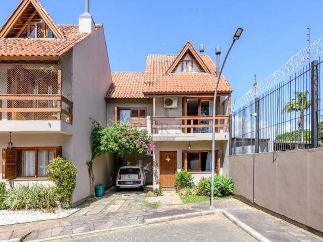 Casa em condomínio fechado com 3 quartos à venda na Avenida Orleaes, 105, Guarujá, Porto Alegre por R$ 549.000