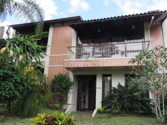Casa com 4 quartos à venda na Rua Upamaroti, 836, Cristal, Porto Alegre por R$ 1.400.000