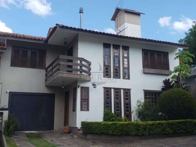 Casa em condomínio fechado com 3 quartos à venda na Rua Doutor Mário Totta, 1925, Tristeza, Porto Alegre por R$ 539.000