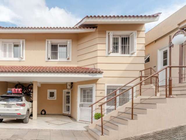 Casa em condomínio fechado com 3 quartos à venda na Rua Costa Lima, 564, Nonoai, Porto Alegre por R$ 520.000