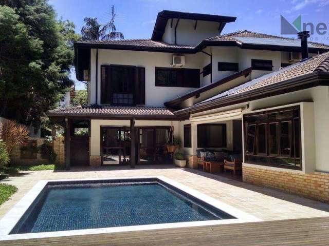 Casa com 4 dormitórios à venda, 447 m² por R$ 2.660.000,00 - Condomínio Chácara Flora - Valinhos/SP