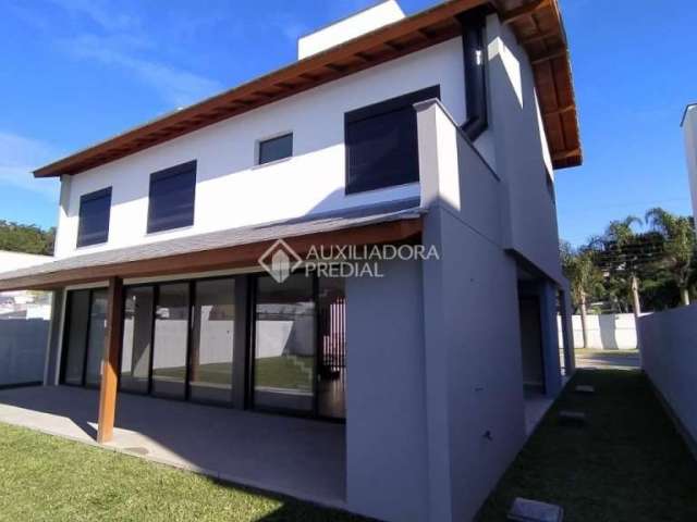 Casa em condomínio fechado com 4 quartos à venda na Rua Leonel Pereira, 2090, Cachoeira do Bom Jesus, Florianópolis, 230 m2 por R$ 1.980.000