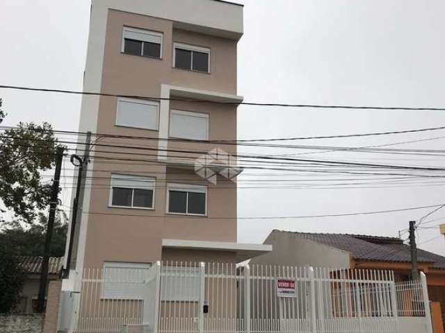 Apartamento de 2 dormitórios com vaga de garagem no Bairro Pinheiro Machado