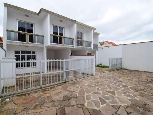 Casa em condomínio fechado com 4 quartos à venda na Rua Professor Antônio Martins Franco, 277, Novo Mundo, Curitiba, 141 m2 por R$ 580.000