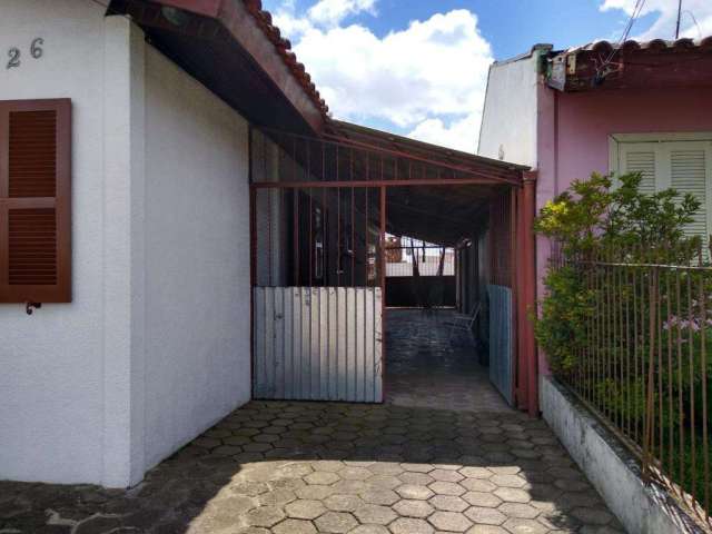 Casa com dois dormitórios no bairro Jardim Fiúza em Viamão.&lt;BR&gt;&lt;BR&gt;Imóvel com dois dormitórios, sala e cozinha, banheiro, área de serviço, lavanderia, churrasqueira, canil e garagem para t