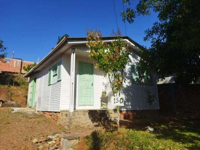 Casa á venda no bairro Fiúza em Viamão.&lt;BR&gt;&lt;BR&gt;Imóvel com sala, cozinha, um dormitório e banheiro.