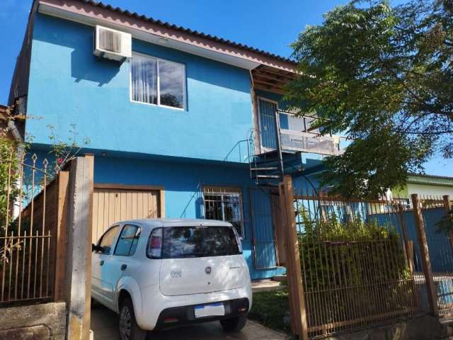 Casa no bairro Planalto em Viamão.&lt;BR&gt;&lt;BR&gt;Terreno com 10x48 com uma casa de dois andares possuindo, duas cozinhas com moveis sob medida, duas salas de estar e duas de jantar, três banheiro