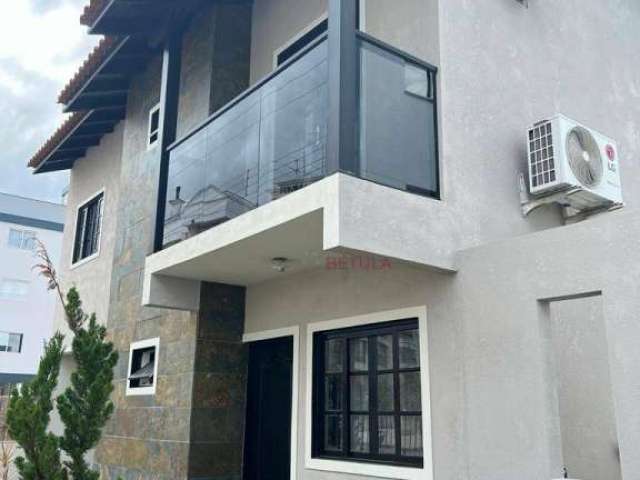 Sobrado com 3 dormitórios à venda, 138 m² por R$ 805.500,00 - Passa Vinte - Palhoça/SC
