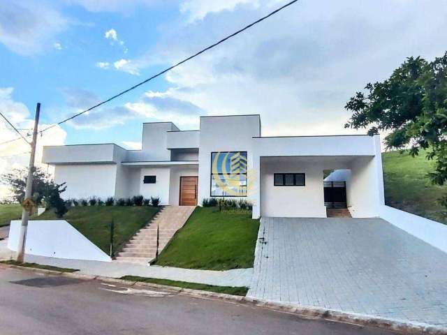 Casa térrea com 3 dormitórios, 1 suíte, 3 salas, área gourmet, piscina, vestiário no Condomínio Cataguá Way por R$ 1.200.000,00