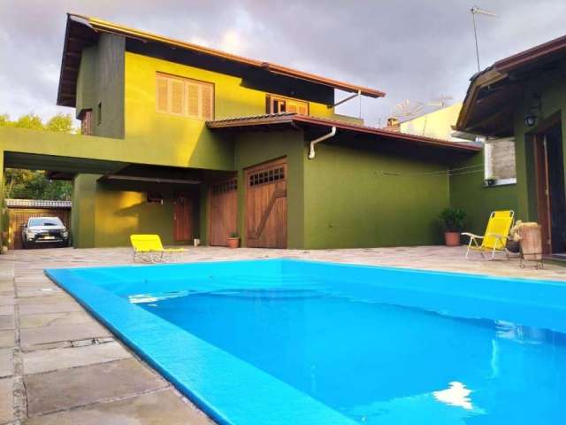 Casa com 3 quartos à venda no Desvio Rizzo, Caxias do Sul  por R$ 1.190.000
