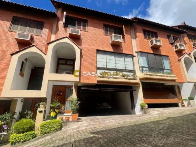 Casa em condomínio fechado com 3 quartos à venda na Rua Padre João Batista Reus, 546, Vila Conceição, Porto Alegre por R$ 810.000