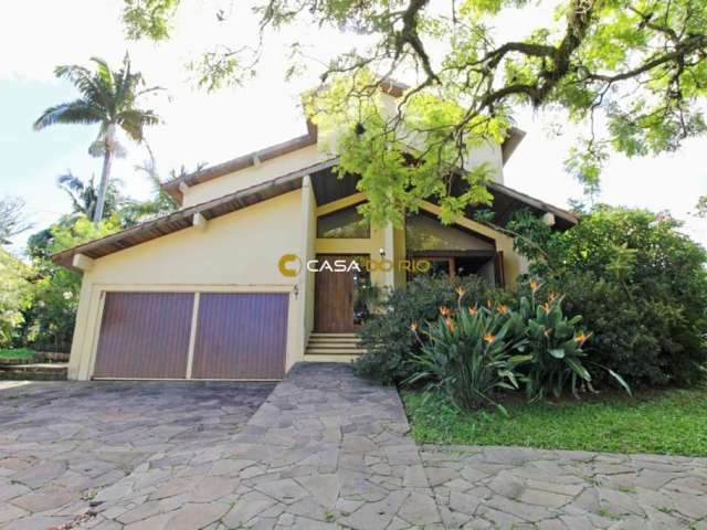 Casa em condomínio fechado com 3 quartos à venda na Avenida Firmino Octávio Bimbi, 255, Cavalhada, Porto Alegre por R$ 1.800.000