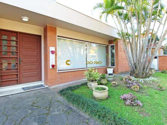 Casa em condomínio fechado com 4 quartos à venda na Avenida Coronel Marcos, 1334, Pedra Redonda, Porto Alegre por R$ 1.380.000