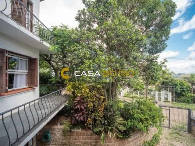 Casa com 5 quartos à venda na Rua Simão Bolívar, 302, Vila Conceição, Porto Alegre por R$ 1.390.000