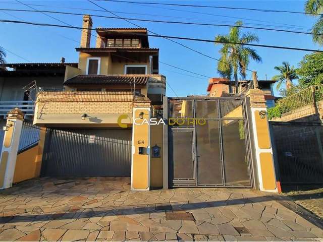Casa em condomínio fechado à venda na Rua Edgar Luiz Schneider, 45, Jardim Isabel, Porto Alegre por R$ 850.000