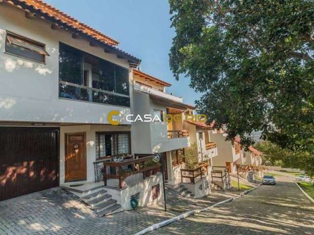 Casa em condomínio fechado com 3 quartos à venda na Rua Alcebíades Antônio dos Santos, 635, Nonoai, Porto Alegre por R$ 639.000