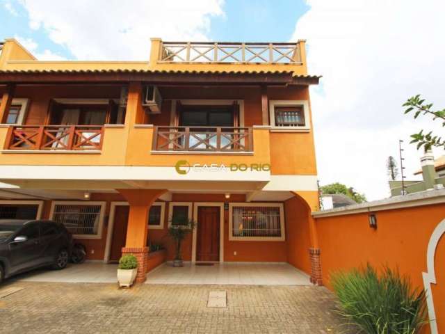 Casa em condomínio fechado com 3 quartos à venda na Rua General Rondon, 165, Tristeza, Porto Alegre por R$ 1.180.000