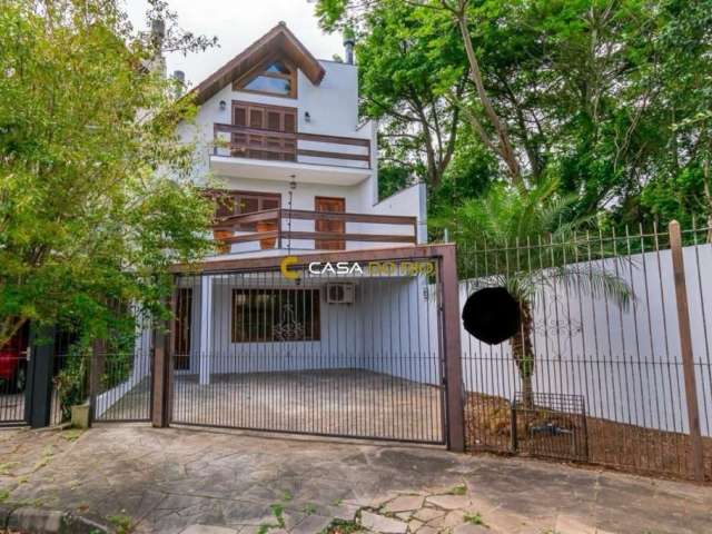 Casa em condomínio fechado com 3 quartos à venda na Rua Jayme Saul de Borba, 72, Espírito Santo, Porto Alegre por R$ 598.000