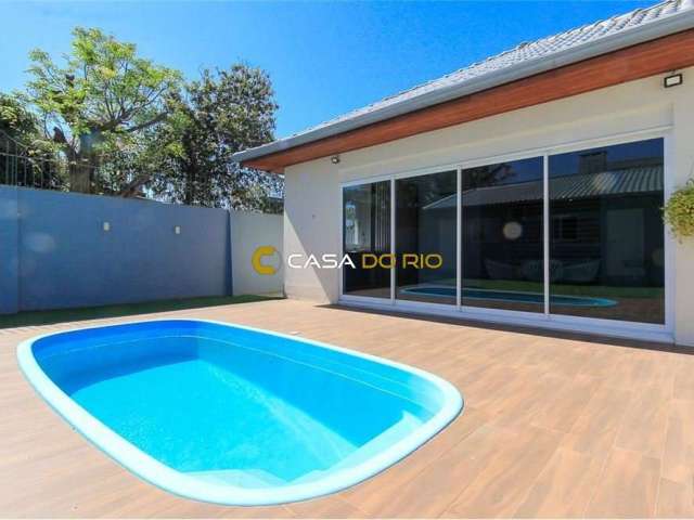 Casa com 3 quartos à venda na Avenida Clemenciano Barnasque, 421, Teresópolis, Porto Alegre por R$ 990.000