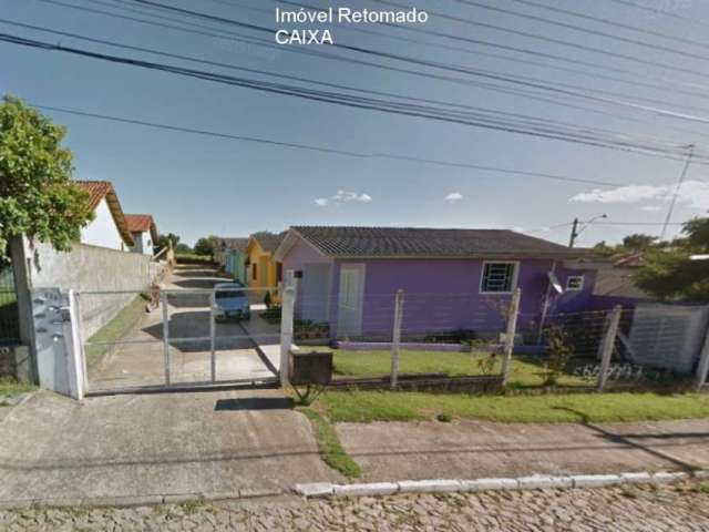 Casa em condomínio fechado com 2 quartos à venda na Avenida dos Ipês Amarelos, 300, Tarumã, Viamão, 59 m2 por R$ 129.200