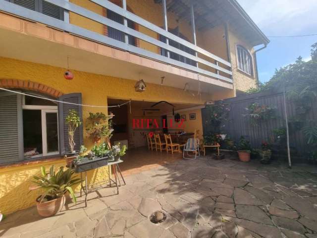 Casa em condomínio fechado com 4 quartos à venda na Bernardino Caetano Fraga, 511, Medianeira, Porto Alegre por R$ 660.000