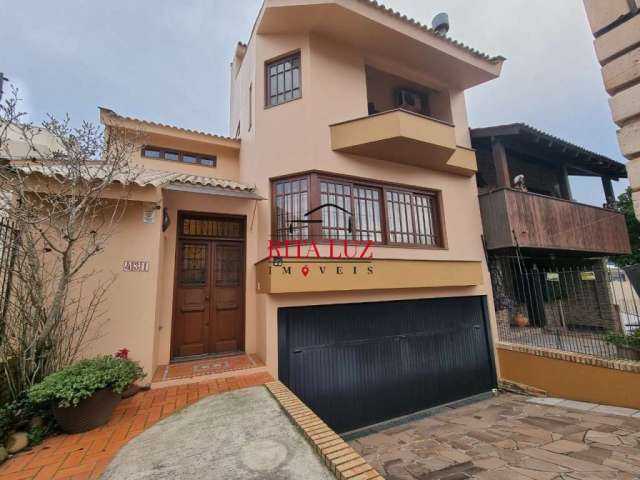 Casa em condomínio fechado com 3 quartos à venda na Rua Martim Minaberry, 431, Partenon, Porto Alegre por R$ 687.000