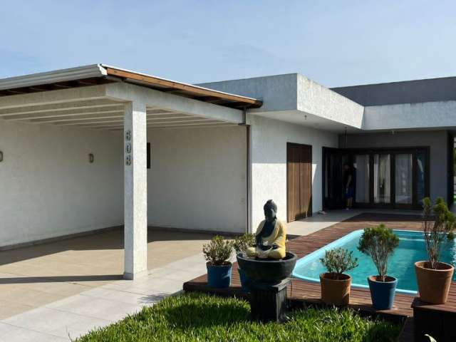 Casa moderna com piscina à venda no Balneário Âncora em Arroio do Sal - RS