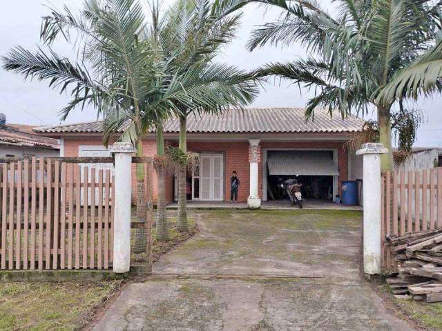 Casa 3 Dormitórios à venda no Bairro Zona Nova - 1 vaga de garagem